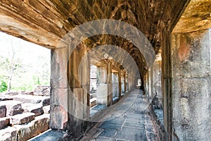 The ancient ruins of a historic Khmer temple in the temple complex of Angkor Wat in Cambodia. Travel Cambodia concept.