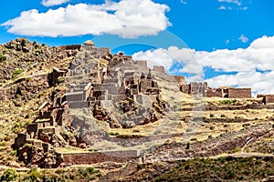 Ancient ruins of Incan fortress on the mountain, Pisac, Peru