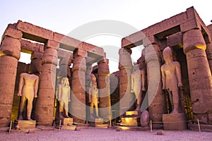 Ancient ruins at Luxor temple during sunset, UNESCO World Heritage site, Luxor, Egypt.