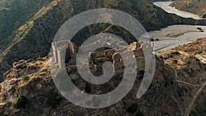 Ancient ruins of a medieval castle on top of the mountain. Amendolea Castle.