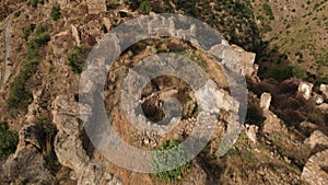 Ancient ruins of a medieval castle on top of the mountain. Amendolea Castle.