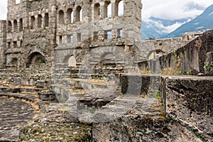 Ancient ruins of old roman amphiteatre built in Aosta. photo