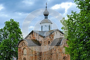 Ancient Russian Orthodox small crossed dome Church of St. Paraskevi or Tserkov Paraskevy Pyatnitsy na Torgu, Novgorod, Russia