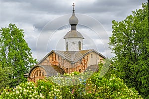 Ancient Russian Orthodox small crossed dome Church of St. Paraskevi or Tserkov Paraskevy Pyatnitsy na Torgu, Novgorod, Russia