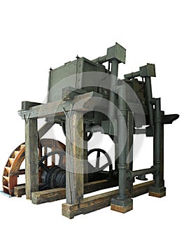 Ancient rusty old wooden water wheel driven machine isolated over white