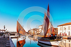 ancient sailboats on Italian Canal Port