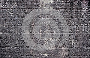 Ancient sanskrit text carved in stone