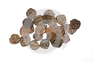Ancient Sasanid bronze coins on white background