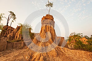 Ancient scenic landscape at sunset. The Sao Din Na Noi site displays picturesque scenery of eroded sandstone pillars, similar