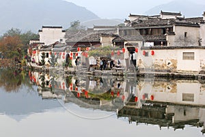 Idyllic reflections at the riverside in ancient water village Hongcun (Unesco), China