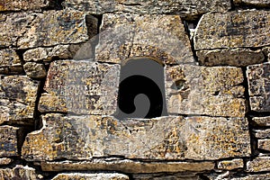 Ancient scripts on the stone in Shatili village in Upper Khevsureti, Georgia