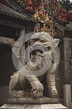 Ancient sculptures of Fu Dogs in chinese temple