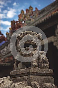 Ancient sculptures of Fu Dogs in chinese temple