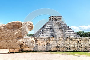 Ancient Serpent Scultpure With Pyramid of Kukulcan at Chichen Itza