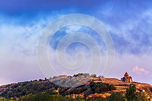 Ancient Sevanavank monastery on Lake Sevan in Armenia during sunset