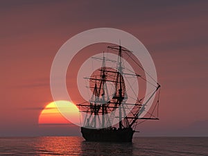 Ancient ship at sunset