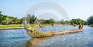 Ancient Siam park, Royal Water-Course Procession, decorated wooden thai boats on pond. Location: Ancient City, Mueang Boran, Samut