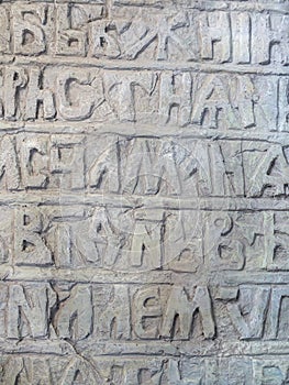 Ancient Slavic illegible inscriptions on a stone