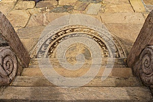 Ancient Sri Lankan semi-circular stone slab or moonstone.