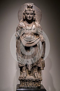 Ancient Standing Bodhisattva schist statue image in 2nd century, Kushan dynasty from Gandhara, Pakistan