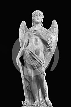 The ancient statue of an angel lowered the extinguished torch down as symbol of death and the end of human life
