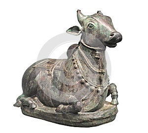 Ancient statue of a bull isolated.