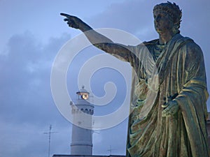 Statue of the Emperor Nero on sunset to Anzio in Italy. photo