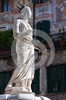 Ancient Statue of Fountain Madonna Verona on Piazza delle Erbe, Italy