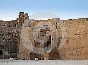 Ancient statue and hieroglyph in the temple of Karnak. Egypt