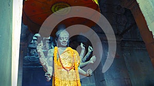 An Ancient Statue of Hindu God, Vishnu inside Angkor Wat, Siem Reap, Cambodia