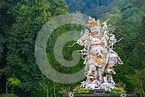 Ancient statue of Kumbakarna in Bedugul botanical garden, Bali, Indonesia photo