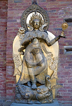 Ancient statue in Royal Palace at Mul Chowk in Patan, Kathmandu