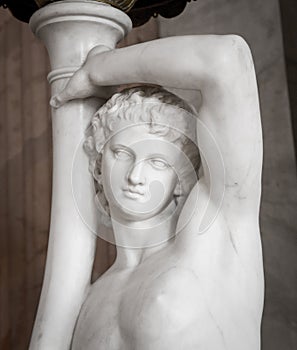 Ancient statue of young man