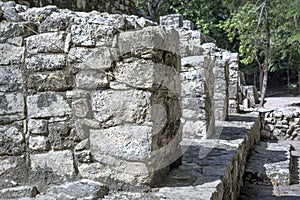 Ancient stone architecture relics at Coba Mayan Ruins, Mexico