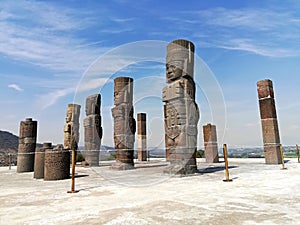 Stone atlantes statues on top of pyramid in Tula Hidalgo Mexico photo