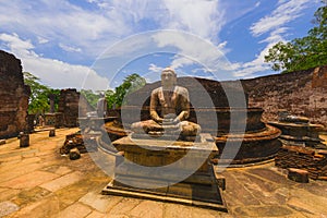 The ancient stone Buddha on the upper platform in the Vatadage.