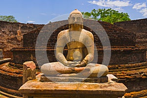 The ancient stone Buddha on the upper platform in the Vatadage.