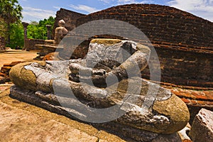 The ancient stone Buddha on the upper platform in the Vatadage.