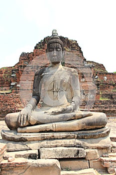 Ancient Stone Buddha at Watyaichaimongkol Temple in Ayudhaya, Th