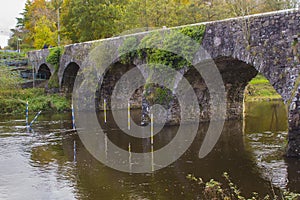 The ancient stone built Shaw`s Bridge over the River Lagan close to the little mill village of Edenderry in Northern Ireland