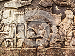 Ancient Stone Carving of Ancient Khmer LIfe Style