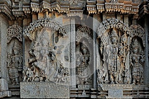 Ancient stone carving of mythological gods in Chennakesava temple or Keshava Somnathpur photo