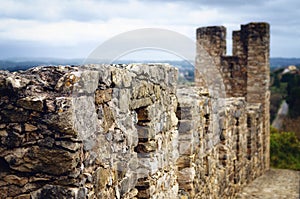 Ancient stone castle walls in Tomar, Portugal