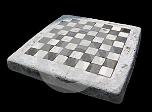 Ancient stone chessboard with marble cells isolated black