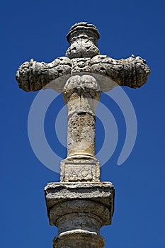Ancient stone cross at the Camino Frances photo