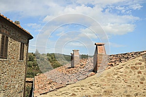 Ancient stone houses in the village of Pereta near Magliano