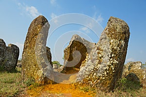 Ancient stone jars in a Plain of Jars Site 1 near Phonsavan, Xienghouang province, Laos.