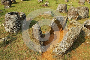 Ancient stone jars in a Plain of Jars Site #1 near Phonsavan, Xienghouang province, Laos.