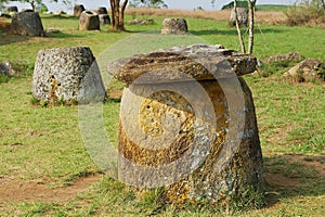 Ancient stone jars in a Plain of Jars Site #1 near Phonsavan, Xienghouang province, Laos.