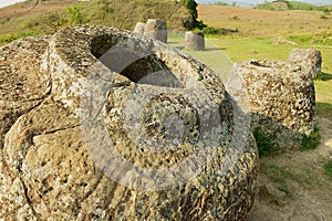 Ancient stone jars in a Plain of Jars Site #1 near Phonsavan, Xienghouang province, Laos.